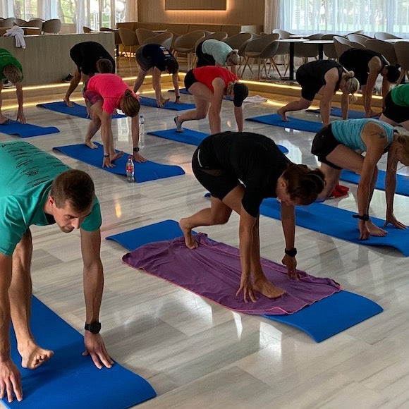 Yoga für Läufer – In dem Bild sind Läufer zusehen, die auch viel Wert auf Yoga legen.